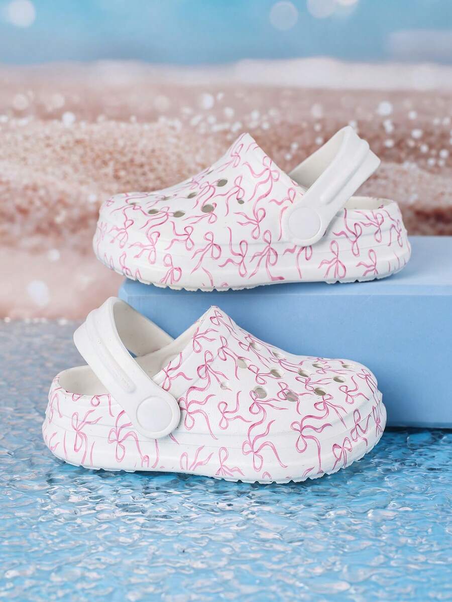 1 par de zuecos cómodos y de moda casual para niñas con estampado de lazo, versátiles para interior/exterior y playa, con protección de dedos - Blanco - Ver 1