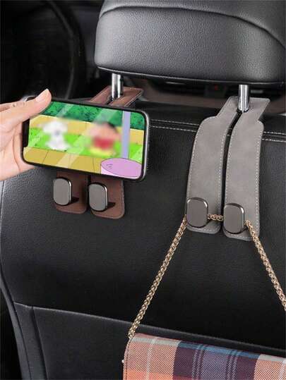 2/1pc Car Headrest Hooks, Made Of High-Quality Leather Material Paired With Sturdy Metal Hooks, Featuring A Stylish And Minimalist Design, While Also Possessing Wear-Resistant, Waterproof, And Easy-To-Clean Characteristics. The Dual Hook Design Can Easily Carry Handbags, Shopping Bags, Umbrellas, Backpacks, Coats And Other Items, Effectively Utilizing Car Interior Space And Avoiding Item Clutter, Keeping The Car Interior Neat And Organized, Suitable For Most Car Models, Secure Fit And Stable, Not Easily Shaking, A Practical Car Accessory For Daily Commuting, Travel And Self-Driving Trips.