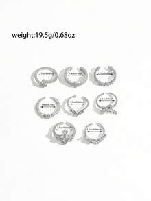 Juego de 8 anillos vintage desgastados de plata con cruz, mariposa, flor hueca con strass y estrella, anillos apilables para mujer - Plateado - Ver 6