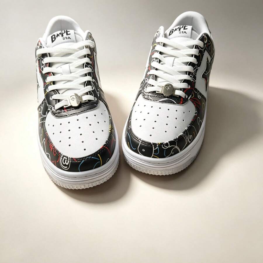 A BATHING APE Bape 休闲运动鞋，撞色星形Logo亮面休闲鞋，黑白喷漆款，男女通用