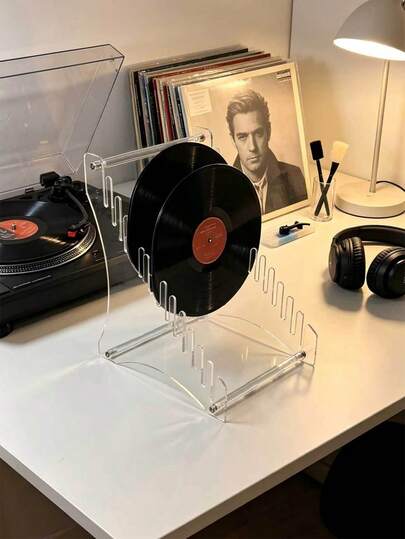 Transparent Acrylic Vinyl Record Storage Rack, Minimalist Slanted Design With Multi-Slot Partitioning. Thickened High-Transparency Acrylic With Finely Polished Edges, Scratch-Resistant To Protect Records. Stable Inclined Support Structure Prevents Tipping. Can Store 12-Inch LP Vinyl Records, Serving Both Display And Drying Functions. Suitable For Study, Living Room Desktop Placement, Convenient For Music Enthusiasts To Organize Their Collection