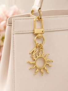 1 pieza Llavero con colgante de sol dorado, dije unisex para bolso, accesorio de lujo - Dorado - Ver 6