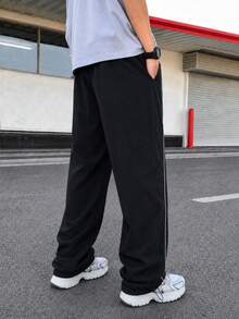男士梭織運動長褲，寬鬆版型，彈性抽繩腰頭，白色飾邊，健身街頭風，黑色，秋季 - 黑色 - 查看 8