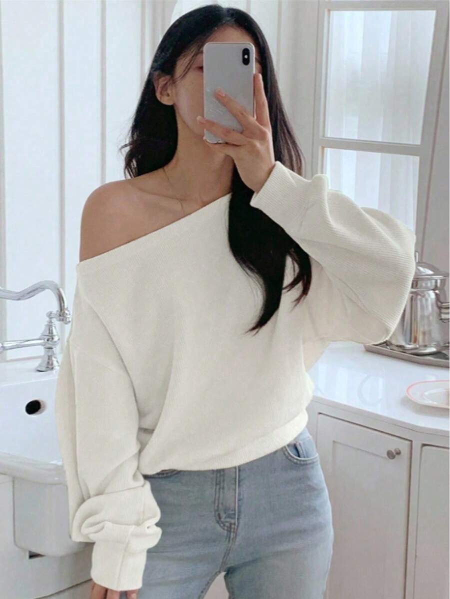 Camiseta de manga larga de hombro oblicuo y holgada de unicolor para mujer, estilo casual, hombro descubierto, para la escuela