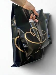 Kit 2 tamanhos Sacola Plástica P e M (P: 25x30 cm e M: 30x40 cm) Kit 50 unidades Coração Dourado - Visão 7