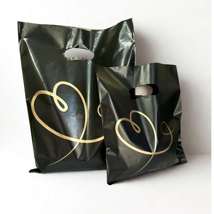 Kit 2 tamanhos Sacola Plástica P e M (P: 25x30 cm e M: 30x40 cm) Kit 50 unidades Coração Dourado - Visão 1