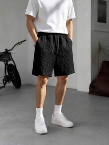 Shorts de punto texturizado para hombre para la temporada de vuelta a la escuela, shorts de uso diario con cintura con cordón, diseño de abertura lateral - Negro - Ver 1
