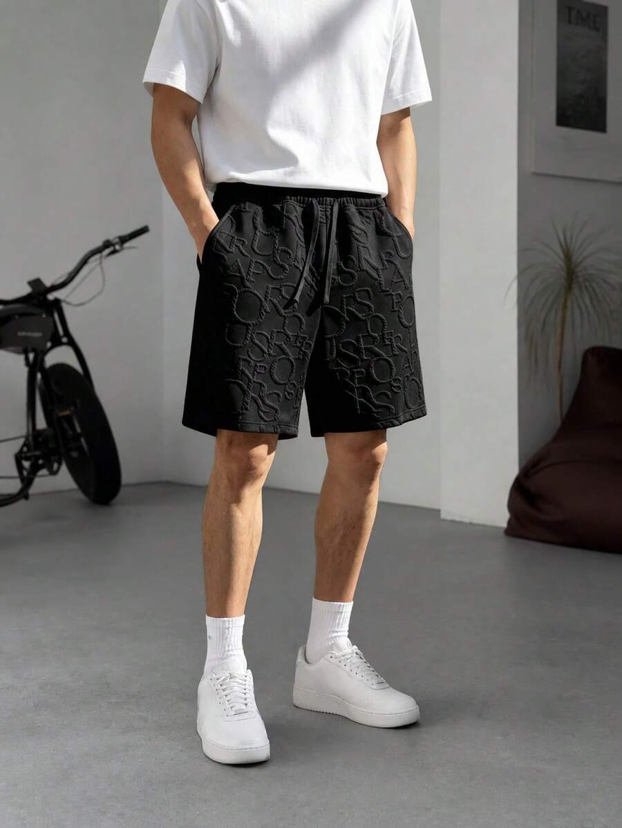 Shorts de punto texturizado para hombre para la temporada de vuelta a la escuela, shorts de uso diario con cintura con cordón, diseño de abertura lateral - Negro - Ver 1