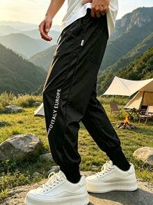 1pc Men's Thin Breathable Mesh Jogger Pants, Printed Loose Casual Long Pants - Black - View 1