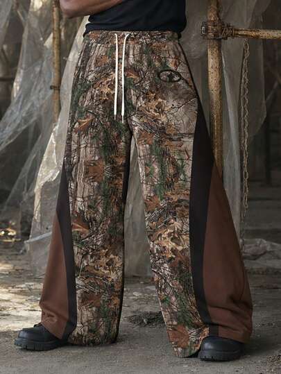 Plus Size Men's American Street Style Colorblock Wide Leg Pants, Woodland Camo Brown & Black Contrast Side, Drawstring Elastic Waist, Relaxed Draped Fit, Streetwear Long Pants For Plus Size Men