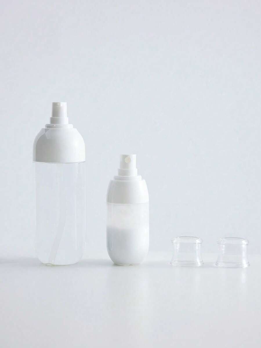 Haus Hana 防漏可填充旅行噴霧瓶 – 便攜式化妝品和香水容器,適用於乳液、海灘旅行、露營和度假 - 無色 - 查看 1