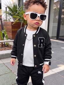 1pc Infant Toddler Spring/Autumn American College Style Baseball Jacket, Black Ribbed Striped Baseball Collar & Cuffs, Front Metal Snap Button Closure, 3D Flocked Large R Letter Patch On Chest, Loose Drop Shoulder Fit, Unisex Baby, Casual Everyday School & Outing Jacket - Black - View 2