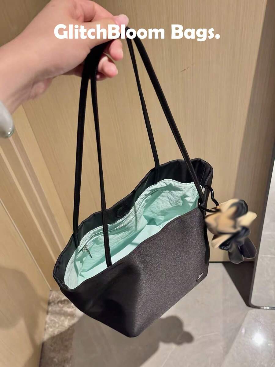 極簡黑色尼龍托特包，彩色內裡，內置拉鍊口袋，輕便休閒單肩包，適合日常通勤與旅行