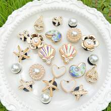 22 pezzi Ciondoli per scarpe serie oceano dorati, conchiglie, stelle marine, fiocchi, accessori fai-da-te, set di ciondoli per ciabatte forate - Dorato - Visualizzare 8