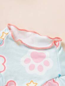 Camiseta para perro con estampado de pata y hueso, ribete de color contrastante, manga corta, ajustada y que cubre el vientre, ropa diaria para cachorro - Celeste - Ver 6