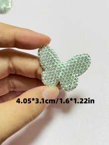 1 pieza Blanco Lujo Brillo Completo de Strass Símbolo de Dólar Bolsa de Dinero Lazo de Labios Oso Mariposa Adorno de Encanto de Diseñador Funda de Teléfono Decoraciones de Coche DIY Sin Adhesión Espejo Retrovisor Accesorios de Salida de Aire del Coche Manualidades - blanco - Ver 10