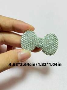 1 pieza Blanco Lujo Brillo Completo de Strass Símbolo de Dólar Bolsa de Dinero Lazo de Labios Oso Mariposa Adorno de Encanto de Diseñador Funda de Teléfono Decoraciones de Coche DIY Sin Adhesión Espejo Retrovisor Accesorios de Salida de Aire del Coche Manualidades - blanco - Ver 11