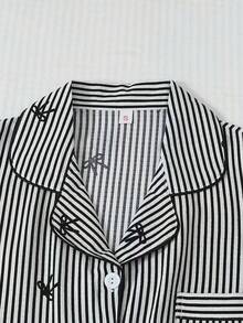 3件組女款睡衣套裝 短袖上衣 + 短褲 + 長褲開襟衫，黑色條紋愛心印花，細節設計，適合居家與戶外穿著 - 黑色 - 查看 5