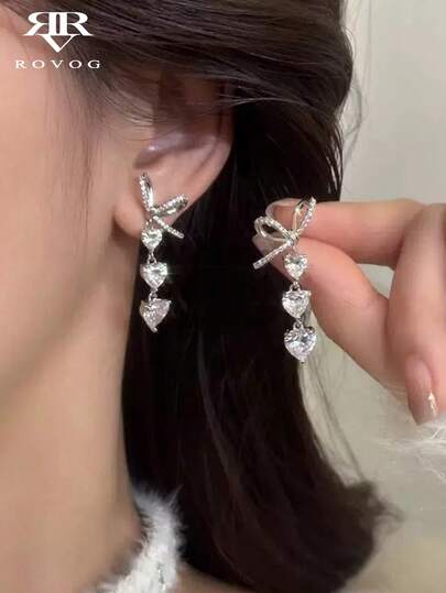 1對時尚優雅蝴蝶結與愛心裝飾耳環，適合女性約會與日常穿著