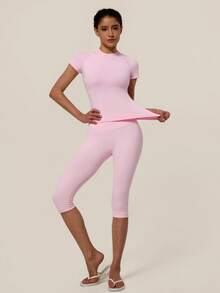 TimeOff Conjunto deportivo de mujer de un solo color sin costuras con cuello redondo, manga corta, cintura acanalada y pantalones de largo medio - Rosa - Ver 7