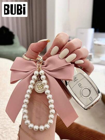 1pc Pearl Bow Keychain, Fashion Accessory For Women And Girls, Universal Bag Charm, Car Key Ring, Wrist Strap Accessory, Holiday Gift, Car Accessory