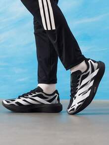 Adidas 男款 2026 春夏 ADIZERO EVO SL EXO M 輕量舒適日常通勤休閒跑步鞋 KI4764 - 黑色/白色/亮金屬鐵灰 - 查看 5