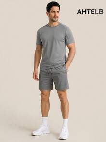 Conjunto de ropa deportiva de 2 piezas para hombre AHTELB, camiseta de cuello redondo con pantalones cortos con cordón, de seda de hielo fina, cómodo, transpirable, elástico, casual, adecuado para deportes al aire libre diarios, ocio y desplazamientos, regalo para esposo, novio, amigo, cliente, padre, conjunto de 2 piezas para hombre, ropa de gimnasio para hombre, gimnasio - Gris Claro - Ver 1