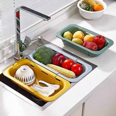 An Integrated And Extendable Water Basin Draining Basket, Suitable For Use In The Kitchen. It Can Be Folded And Retracted, Making It Convenient For Storage And Cleaning.