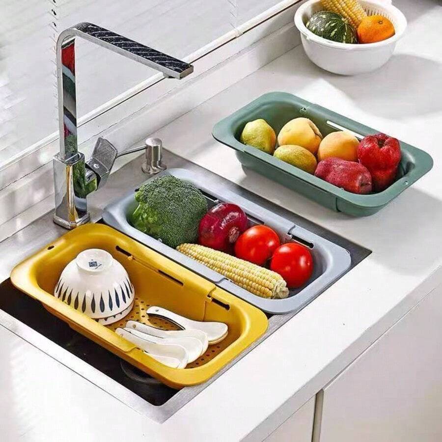 An Integrated And Extendable Water Basin Draining Basket, Suitable For Use In The Kitchen. It Can Be Folded And Retracted, Making It Convenient For Storage And Cleaning.