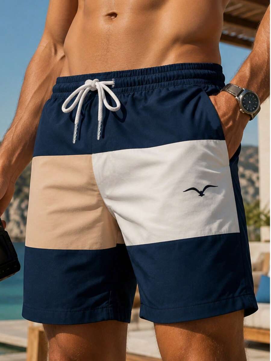 Shorts casuales de playa para vacaciones para hombre con estampado de bloques de color, cordón, cintura elástica, bolsillos inclinados y forro de malla