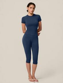 TimeOff Conjunto deportivo de mujer de un solo color sin costuras con cuello redondo, manga corta, cintura acanalada y pantalones de largo medio - Azul Marino - Ver 4