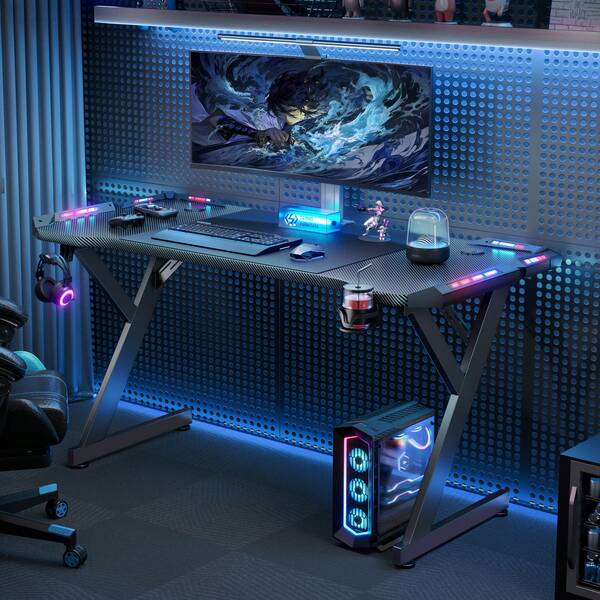 HLONONE LED Gaming Schreibtisch, Gaming Tisch mit LED, Stabiler PC Tisch mit Kohlefaserbeschichtung, Gamer Tisch mit Getränkehalter und Kopfhörerhaken, Schwarz