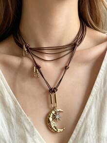 HOTNICE Collar con colgante geométrico de estrella, luna y borla, de metal y cuero, estilo retro elegante adecuado para reuniones de mujeres y uso diario - Marrón - Ver 1
