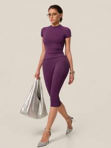 TimeOff Conjunto de mujer de un solo color sin costuras con cuello redondo, manga corta, cintura acanalada y pantalones de largo medio para gimnasio, correr y entrenamiento - Morado - Ver 9