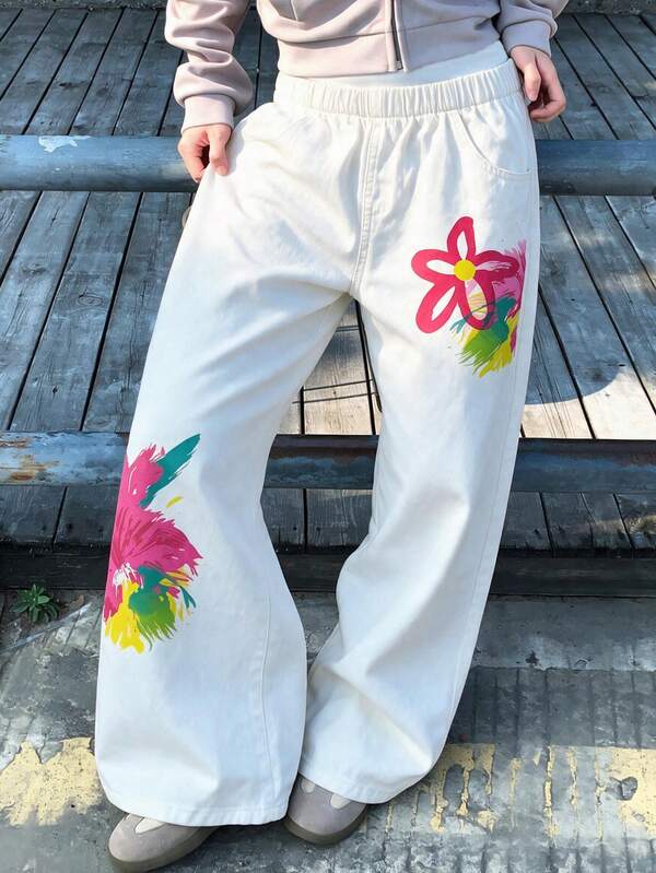 1 pieza Pantalones de mezclilla de pierna ancha casuales y de moda para niñas, estilo femenino lindo con estampado floral de grafiti colorido, pantalones largos