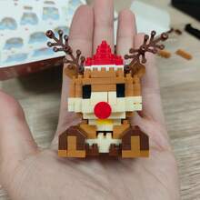 Micro-Particle Mini Christmas Theme Building Blocks Series, ABS Material, Includes: Santa Claus With Gift, Christmas Tree, Reindeer, Blue Hat Snowman, Wooden Bear, Small Train And Other Christmas Building Blocks Gift. Children's Stacking Blocks Toy Set, Soft Stress Relief Item, Creative DIY Educational 3D Handmade Assembly Toy. - Multicolor - View 5
