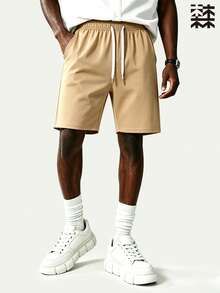 Mulinsen Men's Drawstring Elastic High Waist Straight Leg Bermuda Shorts, Solid Color Minimalist Casual Sports Shorts, Loose Fit Mid-Length Pants - Khaki - View 2