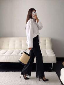 Pantalones casuales acampanados con cintura elástica y ribete de encaje en color negro - Negro - Ver 6