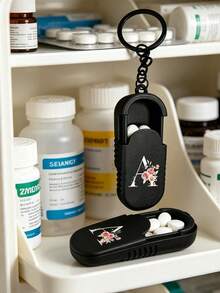 Floral Letter A-Z Printed Pill Keychain, Key Chain Style Mini Pill Box & Slim Portable Medication Storage Container, Backpack Charm, Car Hanging Decor, Phone Chain, Home Decoration, Can Be Hung On Bag, Chain Or Put In Pocket, Travel Portable Small Pill Case, Suitable For Tablets And Soft Capsules; Daily Medication Classification Storage, Commuting, Travel, Outdoor Essential, Also As Graduation Season, Back To School, Teacher Appreciation Small Gift, Student, Office Worker Travel Organizer, Keychain Pill Tube, Portable Pill Pouch, Pocket Pill Box, Hanging Pill Bottle. - Multicolor - View 1