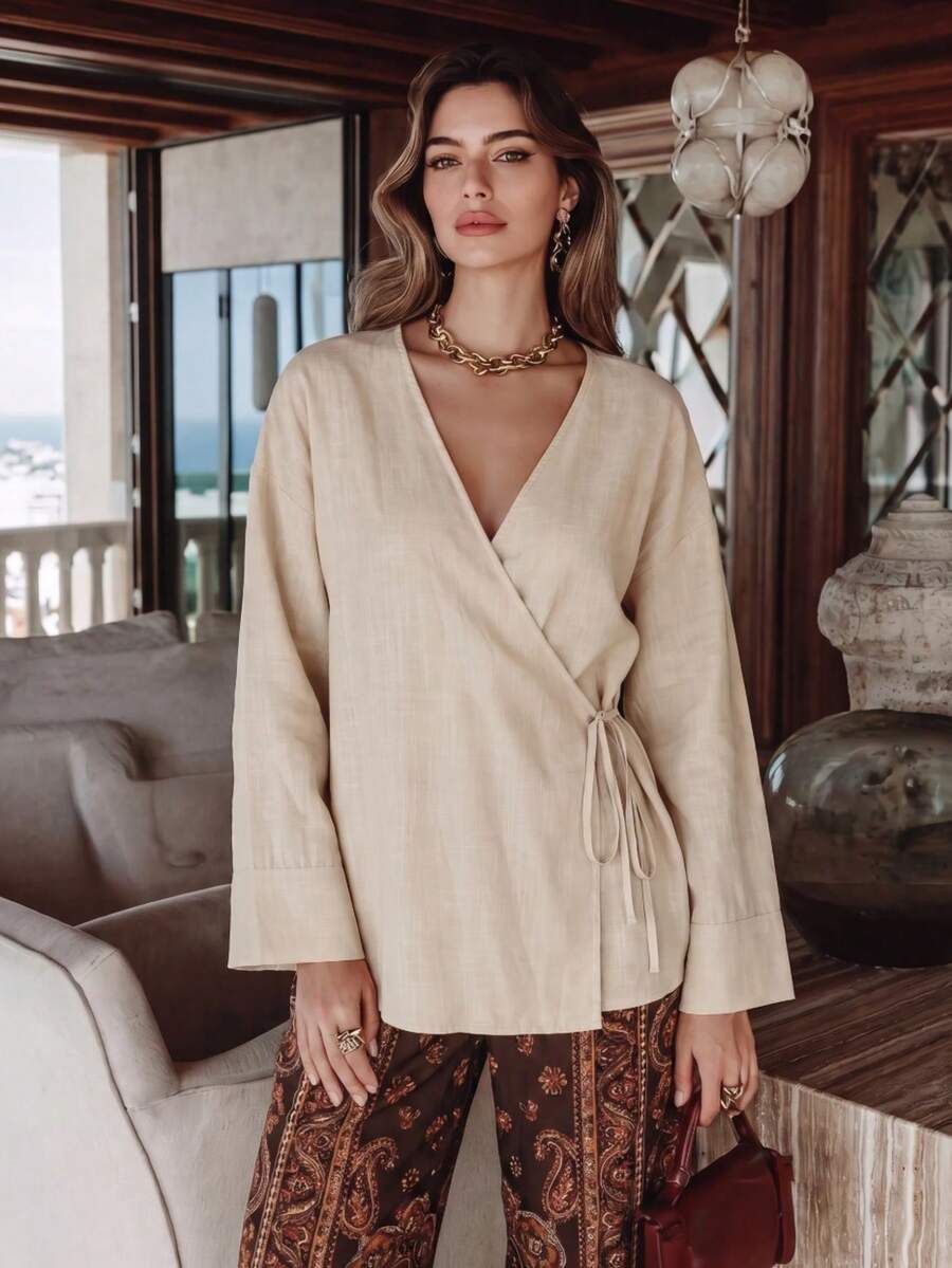 Women's Elegant Long Sleeve Off-Shoulder Loose Top With Flared Hem And Overlap Design, Lightweight Shiny Fabric - Apricot - View 1
