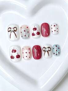 Toloky 10 piezas de uñas postizas de alta calidad hechas a mano, uñas cortas con lunares, lazos, efecto ojo de gato y color nude, estilo Y2K, uñas de verano para uso diario, graduación, viajes, vacaciones, regalos, adecuadas para fiestas, festivales de música y vuelta al colegio - Multicolor - Ver 2