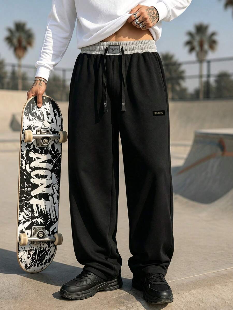 1pc Men's Autumn Black Loose Straight Leg Sports Pants, Grey Contrast Waistband, Drawstring Design, With Mini Boxing Label, Suitable For Skateboarding And American Street Style - Black - View 1
