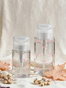 Botella de viaje recargable de PET transparente con patrón de lazo y corazón, dispensador de desmaquillante con bomba portátil de 3.38oz/6.76oz, apta para quitaesmalte, tónico y desmaquillante, diseño de tapa redonda, lavable a mano, reutilizable, botella de desmaquillante - Multicolor - Ver 4