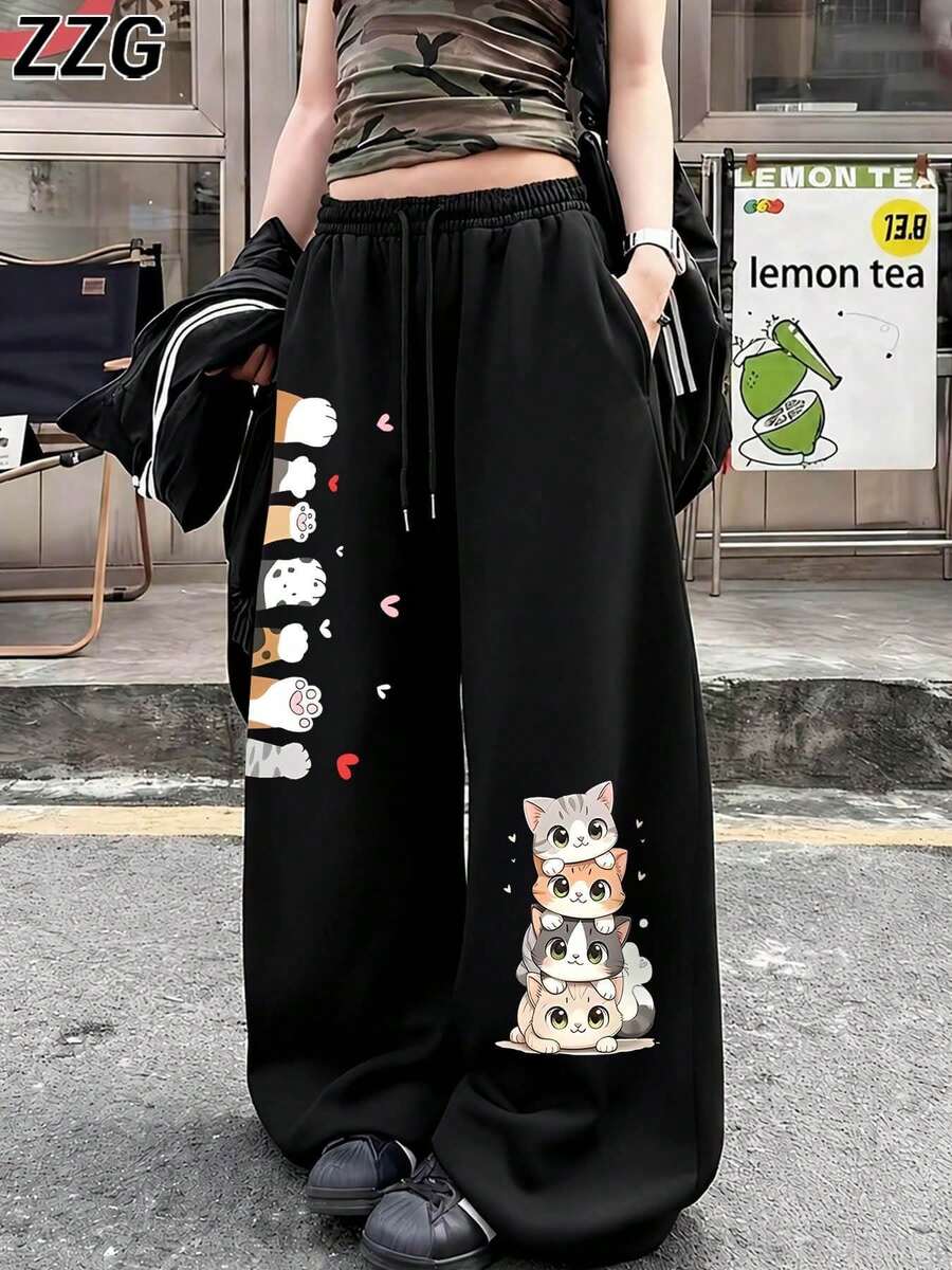 ZZG 春夏女款趣味「卡通貓爪」圖案印花街頭通勤 Y2K 風格黑色前口袋簡約日常直筒長褲 - 黑色 - 查看 1