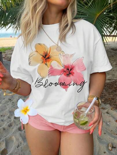 Camiseta de manga curta com decote redondo e estampa floral vibrante