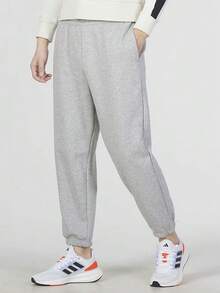 Celana Jogger Pria Adidas All Szn Warna Solid dengan Logo Cetak dan Tali Serut, Warna Abu-abu - Light Grey - View 1