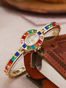 Reloj de mujer ovalado con strass de colores, brazalete de tono dorado con gemas arcoíris, reloj de cuarzo, regalo de cumpleaños, Navidad, Día de San Valentín, aniversario para ella - Dorado - Ver 5