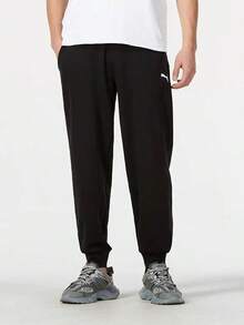 Celana PUMA Pria Hitam Basic Sporty Kasual Bernapas Nyaman dengan Tali Pengikat - Hitam - View 2