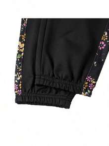 Under Armour Setelan Olahraga Tricot Wanita dengan Motif Samping dan Kerah Tegak, 1365147-005 - Hitam - View 10