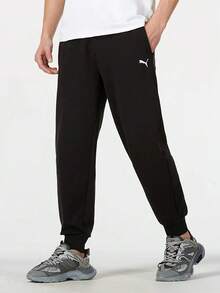 Celana PUMA Pria Hitam Basic Sporty Kasual Bernapas Nyaman dengan Tali Pengikat - Hitam - View 1
